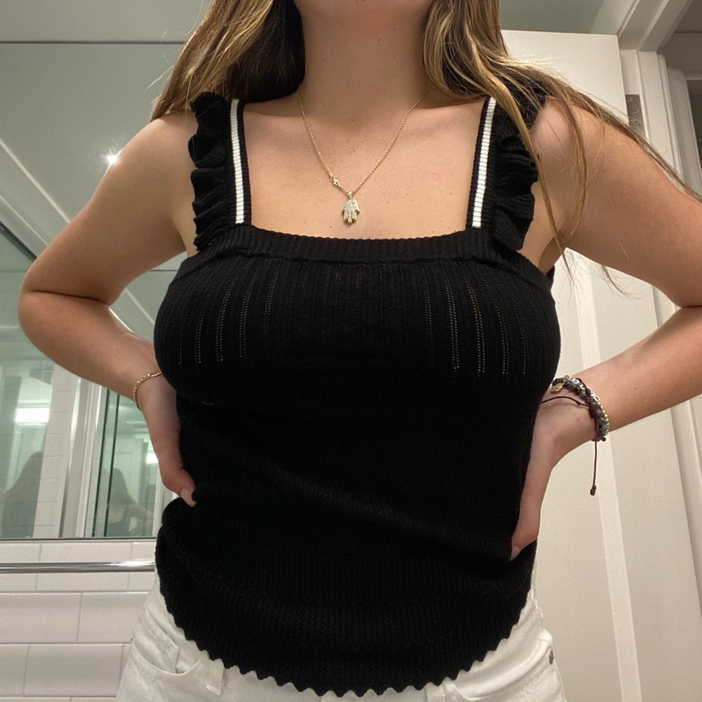 Black top with white stripes.